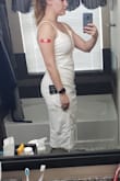 Cute dress, not too long for me even though I'm short. It doesn't lay quite as smooth as the pictures due to the material. I probably could have gone down a size to have it be tighter, but I think the medium works better. Definitely a little low cut for the bustier girls. - Megan C.