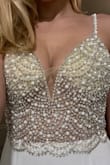 The quality is about as you'd expect for the price. There are some imperfections and the skirt doesn't always law perfectly but soo good for the price. I have a larger chest so the padding made it fit me a little funny up top. Is is see through anywhere up top besides the padding. - Anna K.