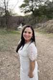 Wore this for my elopement. It was comfortable but I don't think I wore the right undergarments, which could have made a difference in the way it looks on. I am short, so the dress ran long on me but that's okay. Love Lulus! - Tracy T.