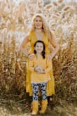I bought this dress for our Mommy and Me photoshoot. No regrets! It was a great choice. Flowy, great for fall, and ladylike. - Golnaz W.