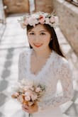 I bought this dress for my 5th wedding anniversary photoshoot. The dress looks so beautiful and I love the way it fits. The dress details are so special and just perfect for a special day. I highly recommend this dress! Love it! - Frances C.