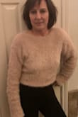 Love love love I would have this sweater in many other colors if they offered it! I am tall I feel at 5'7" and the arms on the sweater are very long on me. Doesn't deter me at all. Favorite sweater! - Lisa D.