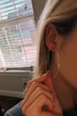 I have the most sensitive ears when it comes to wearing earrings, so I was really hesitant to buy these. After two full days of wearing them, I didn't have ANY sensitivity at all! They are extremely lightweight, fun, and affordable. A must-buy!! - Emily B.