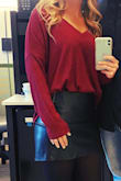 I ordered a medium on accident but I was going for an oversized look anyway so it worked out! It is so cute and so comfortable! I tucked the front in. It's made to do that because it's long and baggy! It comes down to the bottom of my butt in the back. - Emily J.