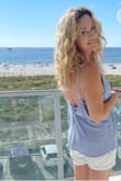 I absolutely love this top. Equally cute with shorts or dressier pants/skirt. The material is thick enough to nix the bra. - Carol M.