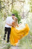 I bought this dress in a small and extra small for our engagement photos and it's flawless. I kept the XS. Won't let me add a photo or I would. - Meg N.
