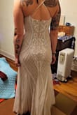 I ended up not using this dress for my wedding dress. My friends liked it on me and thought it was really pretty, but I ended up going with a different dress from Lulus. I like the beadwork on this dress but what I didn't like about it was that it felt really heavy and kind of stiff to move in and it wasn't true white but almost an antique white which I think makes it look dirty. I think each girl has a dress they love and look good in and I just don't think this dress was for me but it was still gorgeous! - Audra V.