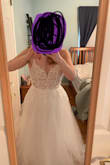 This dress is so beautiful and bridal.
I originally ordered it in a 6 because that's what size fit in other dresses but it wouldn't even come close to zipping so I ordered in an 8 and it fits but that's just about it. Time to hit the gym so I can fit more comfortably in this dress! - Ashley P.