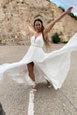 Bought this dress for engagement photos and I could of wore it as a wedding dress it is absolutely beautiful! Might even use it again as my reception dress! - Alicia B.