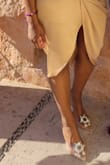 Fits true to size. I thought I would slip out of them for the wedding but they stayed on! Glad I bought these! - Aliah T.