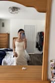 The dress is made for people with hips (it's not straight it curves) overall fit is great I just don't have hips lol great material - Alicia F.