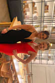 Sleek, sexy, simple, and elegant. The low-cut front and cut-out back details take this simple black dress to the next level. - Stacey T.