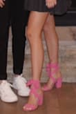 These shoes are so cute and I got a ton of compliments when I wore them, however, they are so tall so they are a little uncomfortable. If you're used to wearing tall heels you will probably be fine but if you're not I wouldn't wear them for long periods of time. So cute and such a fun color though! - Caroline C.
