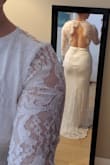 This dress fits well and is pretty comfortable, but I just didn't think it was high quality enough to be my wedding dress. Also, for me, the bright white color wasn't a good fit. (Note: the lace looks weird in the back because I didn't notice one of the scallops was folded under.) - Emily C.