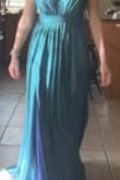 I absolutely love Lulus and felt pretty confident when ordering this dress. 
The color was a bit off, it was still a beautiful blue but not as icy as the pictures. I could have definitely ordered a smaller size but the dress is not flattering on me..(my opinion). Very highl waisted as well. - Callie W.