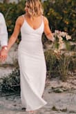 I could not have been happier with this dress. Bought it for a small beach wedding and it was perfect! It looks and feels so much more expensive than it is. Many friends asked if it were a designer. It hugged my body perfectly with enough stretch that I could move. Sexy, but classic. At 5'3, I had to have it hemmed. But I fully expected that. Beautiful dress for the price- 5 star- would 100% recommend! - Rihannan M.