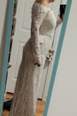 Was hopeful that this dress would win me over as I am a bride on a budget. I like parts of it but am not in love so the hunt continues. Initially bought a med but it was tight around my arms so couldn't close, the sleeves were already too long but I figured if anything they could be shortened. The large fit better but as you can see, the arms were very long and I just wasn't in love with it. The fabric, the way it sat on my body... could work better for a less curvy/busty gal or at least taller. Definitely worth a try at the price point t though! And Lulus is very good about returns. - JUDITH E.