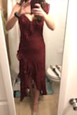I am typically a small in Lulu's dresses and this one fit great. I probably could have fit in a medium comfortably with a strapless bra, but I preferred it without one! A little hard to zip - not because of sizing though! It was super form fitting up top and had some give below the waist. Overall, it is a stunning dress. I can not wait to have an excuse to wear it again. It is comfy, a great length, beautiful material, and just unique enough to subtly stand out. Unfortunately the only picture I took in it all night was in my bathroom before the wedding! Smh, hope this helps!! - Maggie H.
