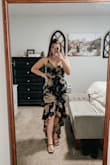 I was accidentally sent an XS the first time around, but when Lulus sent the replacement, it fit perfectly! It's tight (like it should be) and the fabric does not stretch at all. I'm pear-shaped and usually worry about my butt/hips fitting into dresses like this but luckily it did! With 3" heels, it's still a little long for me, so I will probably just pin it a bit. - Julianne D.