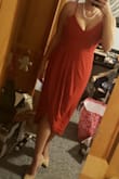 I bought this dress as a back up for my boyfriend's brother's wedding. Knowing I might where it to another wedding coming up on the summer. I love this dress so much I am tempted to wear it to the winter wedding that I will most likely freeze in.
I feel hot and sexy in it yet classy. It does feel a little tight in the bust, but I just don't wear a normal bra with it. The fabric is nice and light. I like how the front falls at my knees and the back is just below my calf. The straps are adjustable. All in all love it and intend to wear it many times. I might surprise my boyfriend with it for valentines day. - Lauren P.