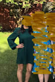 I wore this 3mo after having my son. It hid my stomach but was short enough to show off my legs. I felt great in it! I also wear it as a shirt sometimes. Gather the bottom, wrap an elastic around it, and tuck underneath. Viola! Pairs well w leather pants and stilettos. - Jenn W.