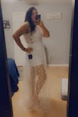 Fit perfect just a little long but not too long where it needs alterations. I am in love with this romper! Wearing it after the introduction at my wedding. :) - Jessica D.