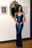The dress was perfect for the Mardi Gras ball I attended. Loved the peacock blue color. Wish it had been a little longer but I just wore shorter heels. Overall 5 stars! - Michelle N.