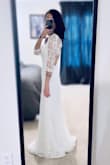 I didn't think this dress would be such a great fit, considering how petite I am. I expected several alterations to be made, but it looks like I just have to hem it a couple of inches (because I don't intend to wear heels at our wedding). The dress is elegant and classy, feels comfortable and the price can't be beaten! Perfect for our belated wedding reception this summer. My husband loves it too. I'm so glad I picked this one! - Ada S.
