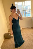 I adore this gown! I didn't need a bra with it, the material is thick, and it's so flattering. My boyfriend loves it and I feel so beautiful in it! I'm 5'9" and it's quite long on me. It's a little snug zipping up my back, but it feels great and I love it so much! - Jennifer