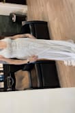 My wedding isn't until October but I saw this dress online and I fell in love! In fact, I never even made it to the bridal shop to try any on. I ordered this one and tried it on and it fit so perfectly! I went into a Lulus outlet store nearby to see what size I wore. I thought I was an 8 but the dresses I tried on there were size 10. After that, I was so worried because the size Large in this dress was sold out. I decided I needed to order the medium and see how it goes and I'm so glad I did! Now I'm even more excited for my big day! - Dawn C.