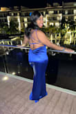 The dress looks just like the picture. The straps run a little big but you are able to cross them to make the dress fit tighter. I def would have gone down a size but overall the dress was comfortable and fits nicely. I just had a baby and was able to feel good about myself. Didn't look too bad with my belly. Had an amazing time! Wore it to a wedding. - Shetoi F.