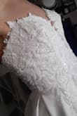 This dress is stunning, the details are beautiful. I tried on a very similar dress in a bridal shop for thousands. When I saw this dress online I had to try it. With quick steam to get the wrinkles out (not steamed yet in photos below ) Lulus Saved me thousands on my wedding dress without compromising how I look. - Olivia C.