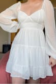 I am absolutely in love with this dress! It fits absolutely perfectly and will be the perfect dress for my engagement photos. The material is high quality and it is not see through at all. As an added bonus, the shipping was extremely fast! I can't wait to buy more dresses from this store. - Quinncy K.
