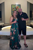 Beautiful dress! It's long for me, even with heels. It fits everywhere, just a little snug around the lower/back waist area. Still looks fantastic and I wouldn't go up in size. - Nicole F.