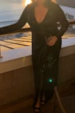 I felt so good in this dress. Very comfortable. Received compliments all night. Ran just slightly large, but wouldn't necessarily recommend going down a size. I'm typically a 14 and wore an XL. I did need to wear a plunge bra as the front dips quite a bit. - Elizabeth O.