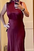 Gorgeous dress am going to keep for a future event maybe. As a mom it shows that mom belly. I believe it's just the material and others may not notice it but I do. - Merilu H.