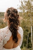 I initially did not think I would like this wedding dress (was scared to go backless), but I kept coming back to it and I'm so glad! I got so many compliments and it held up great. I had a second one for my reception and never ended up changing into it because this one was so comfortable. - Pamela S.