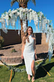 Beautiful dress, but runs a size big. Unfortunately for me it doesn't come in XXS, but I used double sided fabric tape to help hold it in places and it looked gorgeous. Wore it for my bridal shower. - Caroline H.