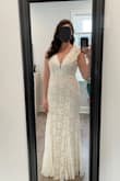 This dress is even more beautiful in person.  The fit is exactly as expected and is very comfortable.  I would highly recommend this dress! - Rachel G.