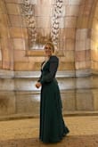 This dress fits perfectly! I did get it hemmed a couple of inches, but taller heels would have worked too. It frames you so perfectly and I love the open back. The color was gorgeous. - Alysha