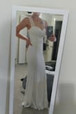 I truly was not expecting this to fit so well and to be such beautiful quality. I put it on and was immediately in tears of joy. The length was perfect, hugged my hips just right, it is comfortable enough to sit and to dance in, it isn't see-through. I've tried on $1,000+ dresses and none of them compared to how well this one fits and looks. Great job Lulus! I cannot wait to wear this on my wedding day. - Kaitlyn I.