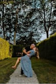 I bought this dress to wear for my engagement photos and it DID NOT disappoint. I have broad shoulders and upper arms that I wish were thinner and off the shoulder, the sleeves fell perfectly to slim my figure. It was so light and comfortable that wearing it on a 90-degree day was the best decision I made. - Meagan S.