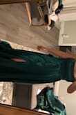 I ordered a bunch of dresses from different stores for my SIL wedding as I am a bridesmaid. This one was the winner by far! I would have normally bought a 6 but they only had a 4 - which worked out great! The corset allows you to adjust as needed in the back and the skirt starts about the hips so there is room to order a size smaller. Fabric and cut is beautiful!! I walked around the house for a while because it just felt so nice on. - Amanda Q.