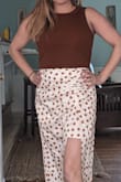 I bought the bodysuit to go with a white polka dot skirt from Lulus, they were a perfect match. Very light and comfortable, yet had a dressed-up sophisticated look, perfect for watching a hot outdoor golf event. I do wish the snaps on the bottom were sturdier, there were times I had trouble keeping them snapped. - Elena C.