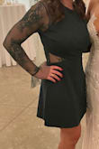 I wore this to a winter wedding and got soo many compliments. The fun detail on the sleeves and side were perfect. I ordered a M. - Nicole S.