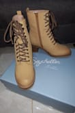 More narrow than usual boots but fit great and stylish - Ken B.