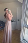not my colour I'm too pale lol but its a bridesmaid dress and I love the style its stunning! its slightly tight but a medium would've been to big for me also its pretty long so i will need it hemmed but I expected that - Talia L.