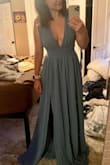 This dress is very flattering and sexy. I got an extra small and it fits perfectly! Its pretty long, so Ill need to wear heels or get it hemmed, but that was expected. The color is beautiful and exactly as pictured! - Kenzy H.