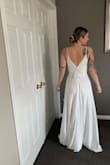 I work in bridal and couldn't decide on what I wanted to wear for my beach wedding coming up in November. I bought a few dresses to try and put this on and knew it was perfect!

I will be adding buttons to the back where the zipper is, take the straps up just a bit and a hem and it will be my dream dress!

I purchased a 6 when I typically wear a 4, so it's a tiny bit big which is easier to take in than smaller. 

I'm from Canada and did have to pay duties, and sending back my other dresses was no issue at all! 

Thanks, Lulus :) - Natalie E.