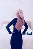 This is your new go-to LBD! 
Wore to a February wedding and loved it. So many compliments that it was classy and yet super sexy. Great fit. Length fell a little below the knee. Felt very breakfast at Tiffany. The back was the Oh hey now moment. Revealing enough without being too much. Hugs ALL the right curves. 
The boning in the back gives great structure. 
I danced and easily moved around without worry. 
I didn't give five ***** for two reasons. First, the sleeves are somewhat long. Not a deal-breaker because I could tuck them up. 
Second, the shoulders were slightly slipping. So just applied double-sided tape on the inside of the shoulders and voilà! No slippage. 
Don't hesitate. TYS - Catherine K.